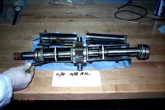 Left outboard aileron actuator - cylinder rods - secondary position