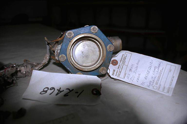 Auxiliary tank fill/isolation valve - valve slide