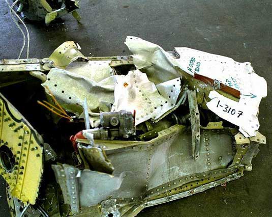 Left wing fuel dump valve actuator attached to wing structure