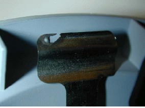 Non-SR 111 exhibit with signs of a short circuit on the holder of the spare bulb in the light assembly