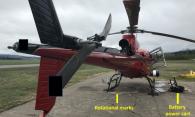 Figure 1. The occurrence helicopter shortly after the loss of control (Source: Smithers Royal Canadian Mounted Police [RCMP], with TSB annotations)